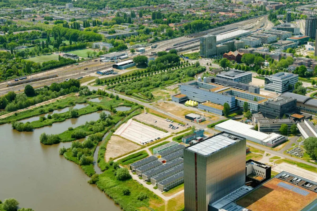 Aerial view of the data center campus of Amsterdam, showcasing its historic buildings and surrounding green spaces in the Netherlands.