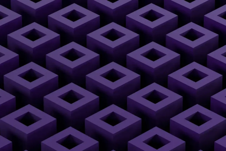 A rich purple backdrop featuring an array of assorted cubes scattered across the surface.