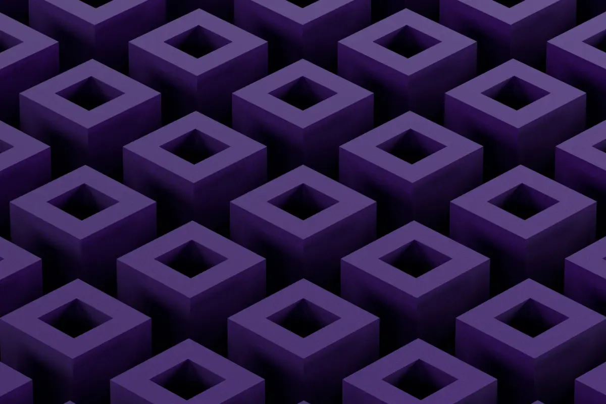 A rich purple backdrop featuring an array of assorted cubes scattered across the surface.